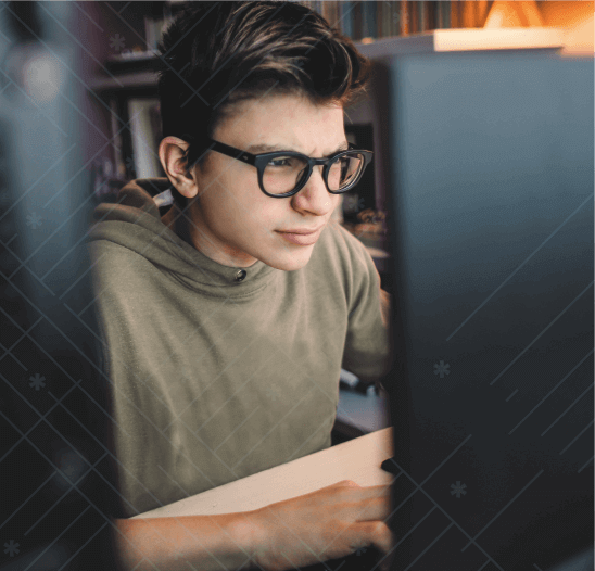 Kid taking a computer coding class