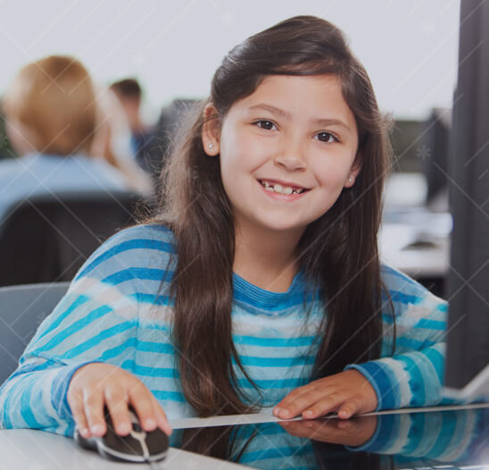 Middle school girl in computer class