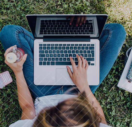 Girl outside on the computer