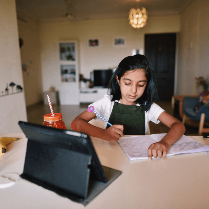 Girl learning to code at home