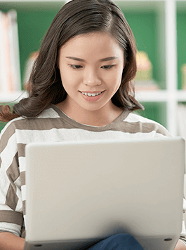 asian high school girl on laptop computer