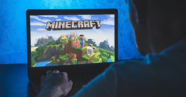 Boy on Computer Playing Minecraft