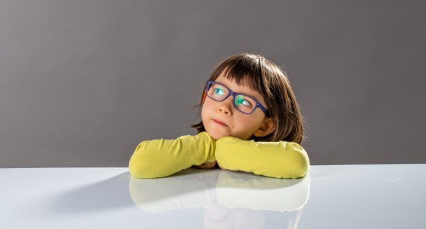 Girl in yellow learning logical reasoning for kids