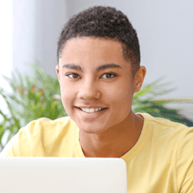 Smiling high school student in online summer camp