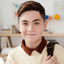 Smiling boy in summer coding class